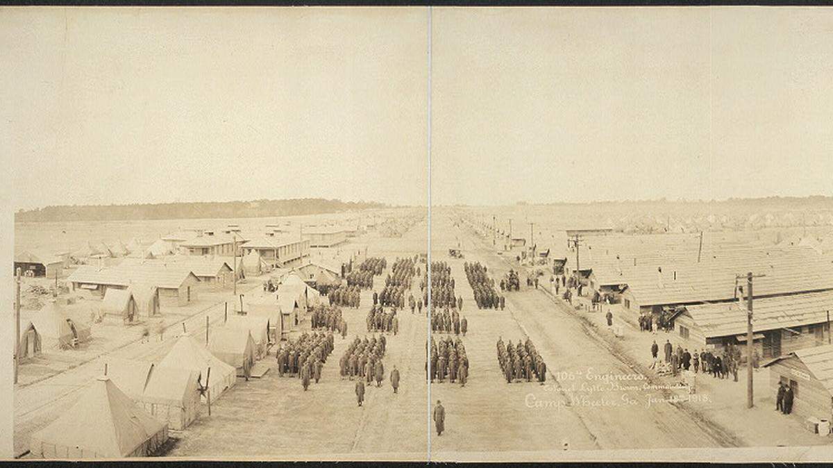Members of the 106th Engineers under Commander Col. Lytle Brown stand next to barracks at Camp Wheeler in what is now Macon. Wheeler was a training base for the U.S. Army during World War I and World War II.