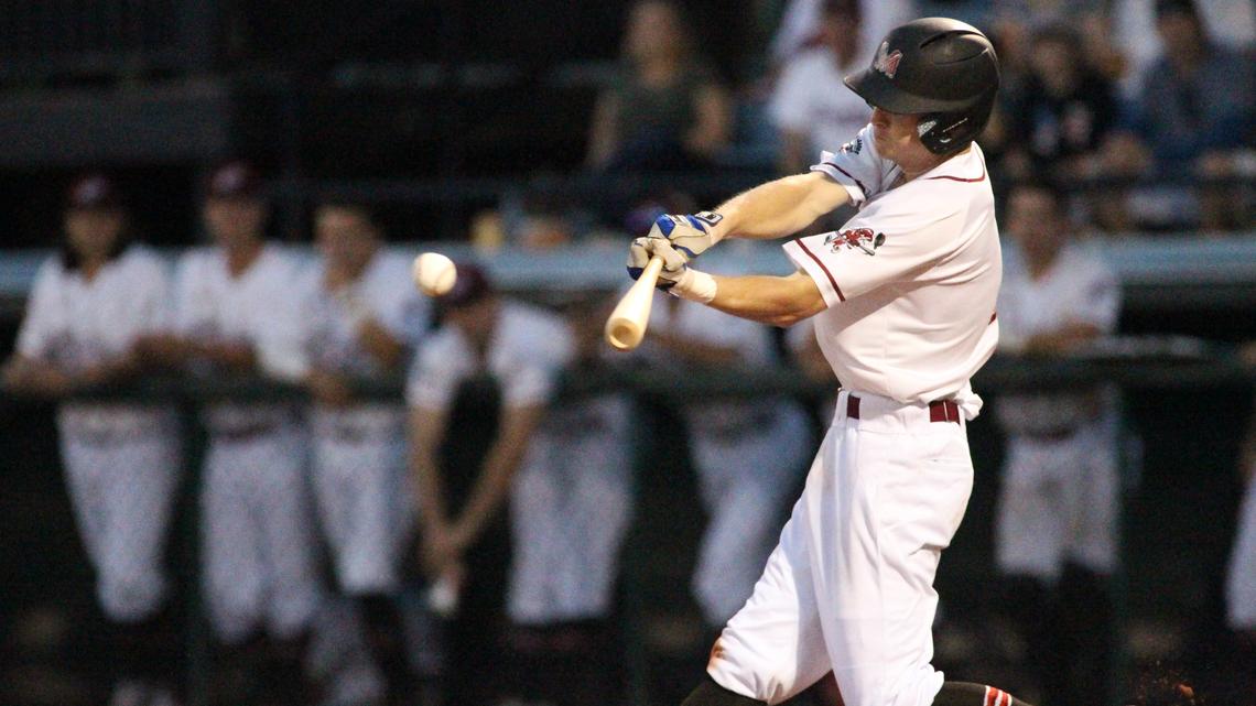 Former Perry High School standout Cal Gentry connects for a stand up double in the fourth inning of the Macon Bacon's home game opener Friday.