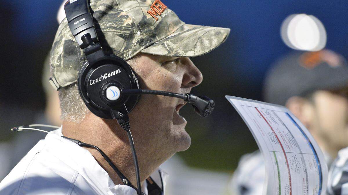 Mercer head coach Bobby Lamb calls a play from the sideline during their game against Chattanooga Saturday.