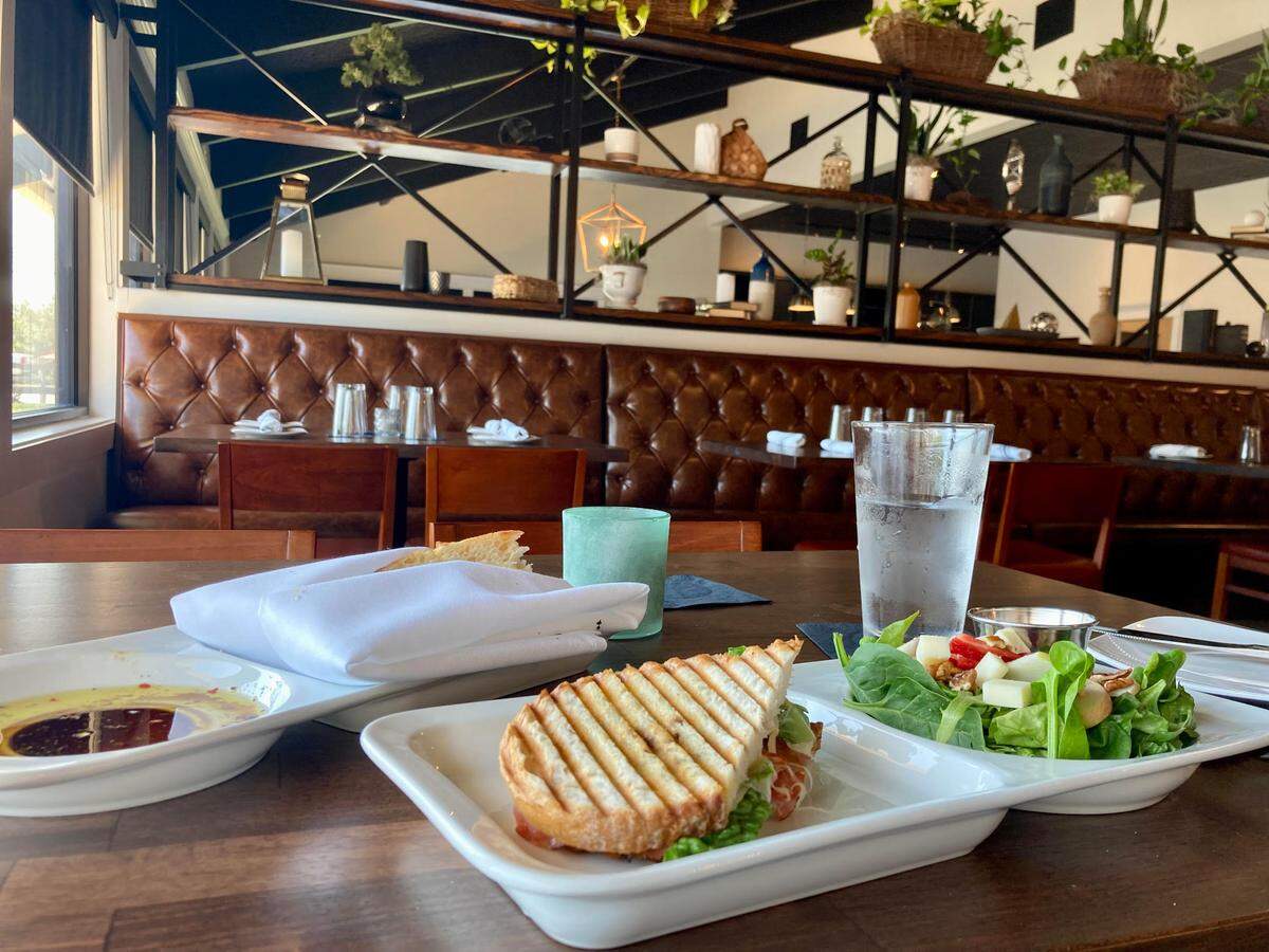 A lunch option at Fresco Italiano in Warner Robins: half an Italian panini made with salami, hot ham, soppressata, pepperoni, balsamic vinaigrette, lettuce, tomato and provolone cheese and a half Sylvester salad of mixed greens, strawberries, apples, pecans, fontina cheese with raspberry vinaigrette.