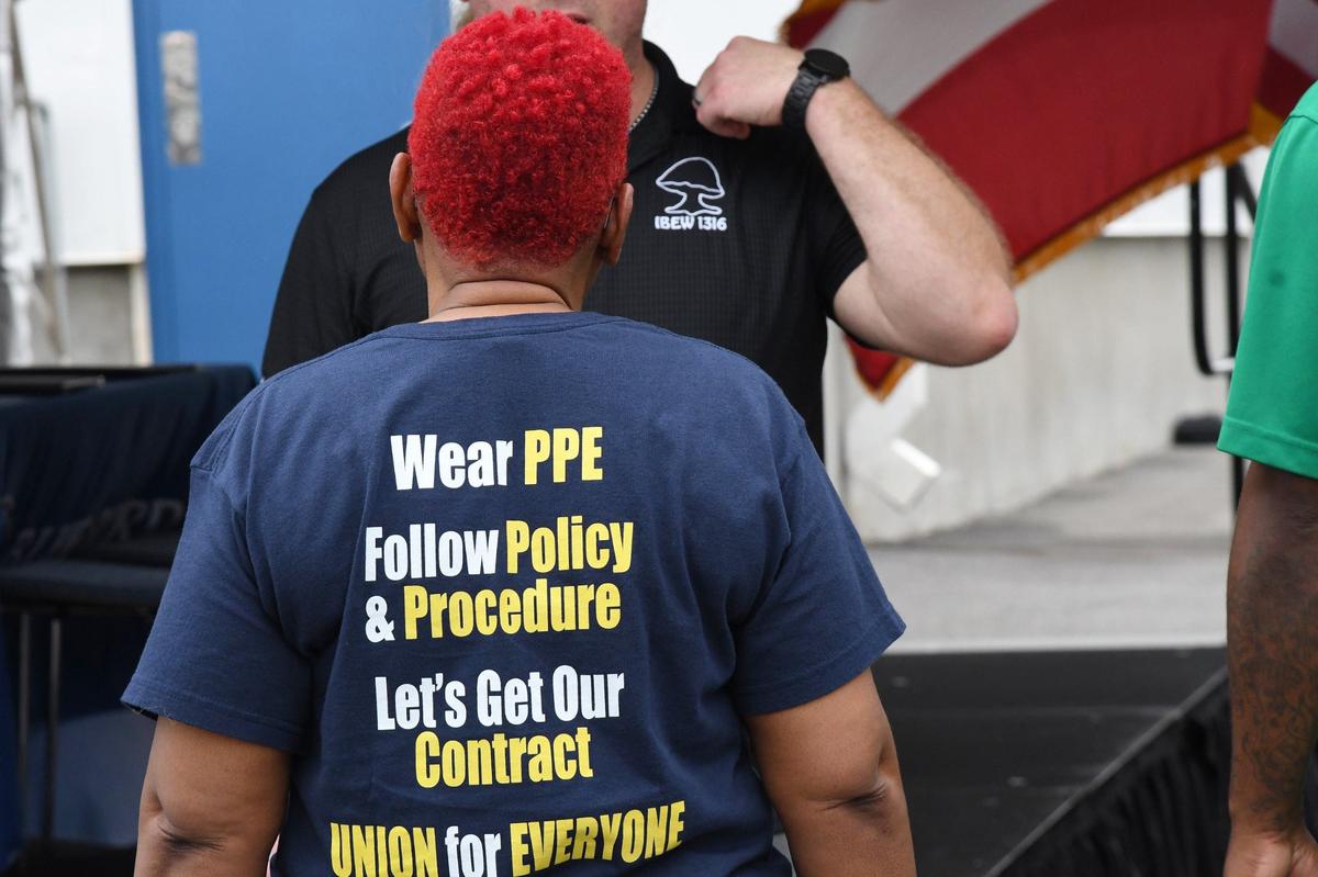 Blue Bird employee Carolyn Allen wears a Bluebird Workers United t-shirt while celebrating Blue Bird’s union contract on Friday, July 19, 2024, at the Blue Bird manufacturing plant in Fort Valley, Georgia. Blue Bird electric bus manufacturing workers ratified their first union contract in May, joining United Steelworkers and securing wage increases, safety improvements and more employee benefits.