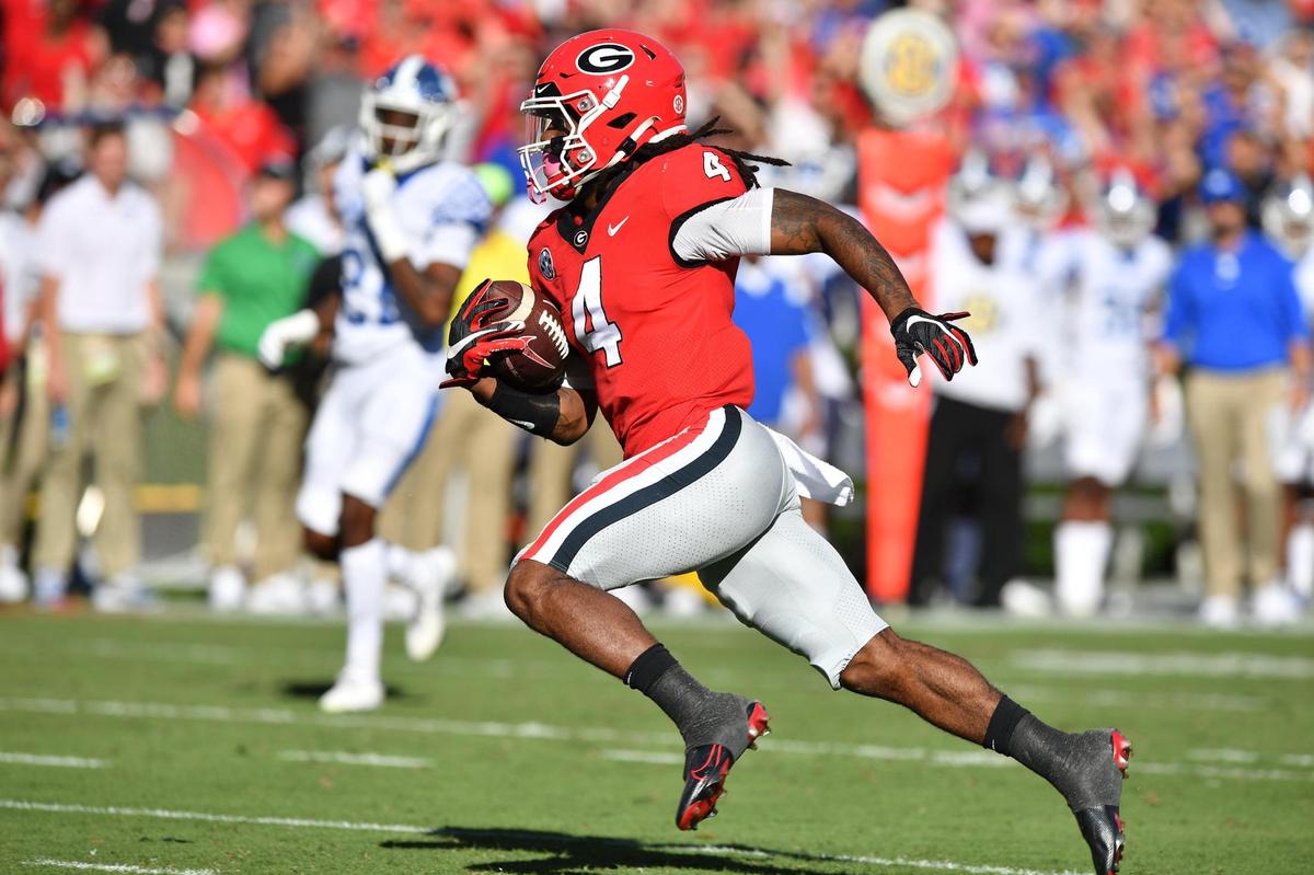 DONN RODENROTH,Athens, Georgia, 10/16/2021: Georgia’s James Cook heads to the endzone for a touchdown Saturday against Kentucky.