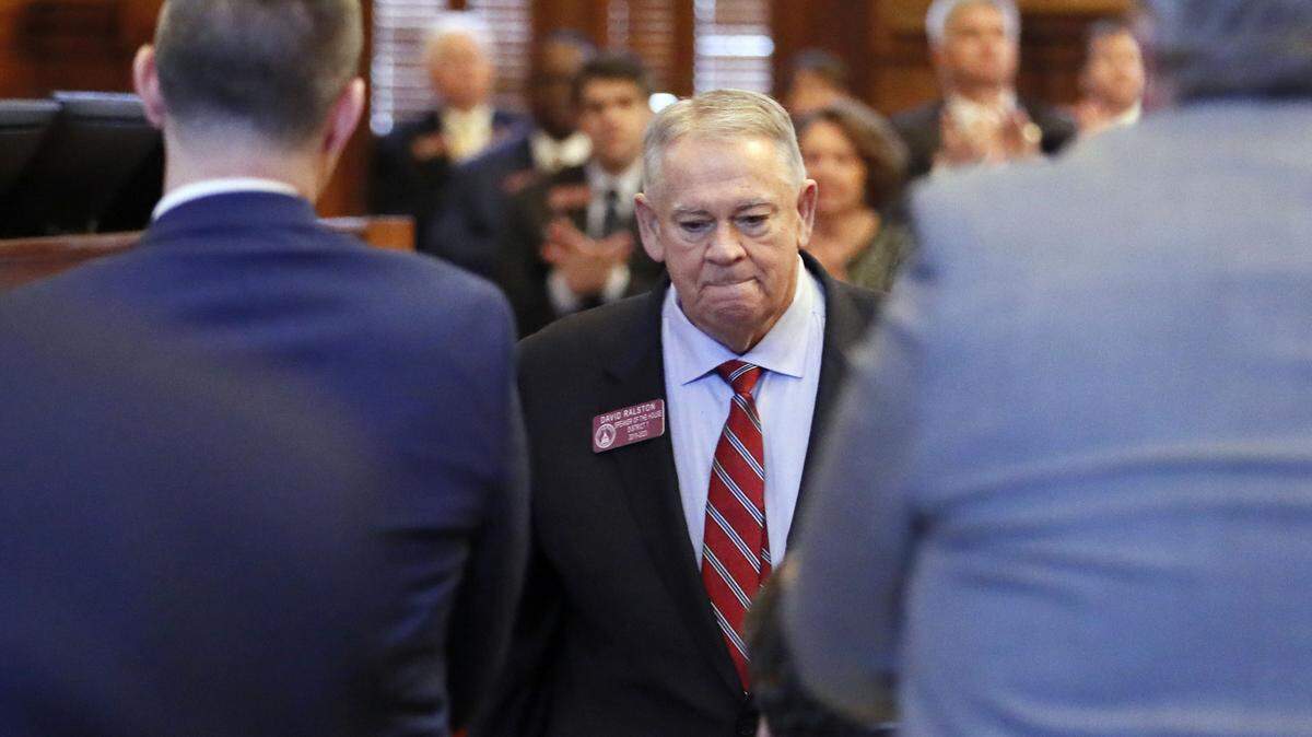Georgia House Speaker David Ralston leaves the well to a standing ovation after he spoke during Morning Orders to address accusations that he has abused his authority.