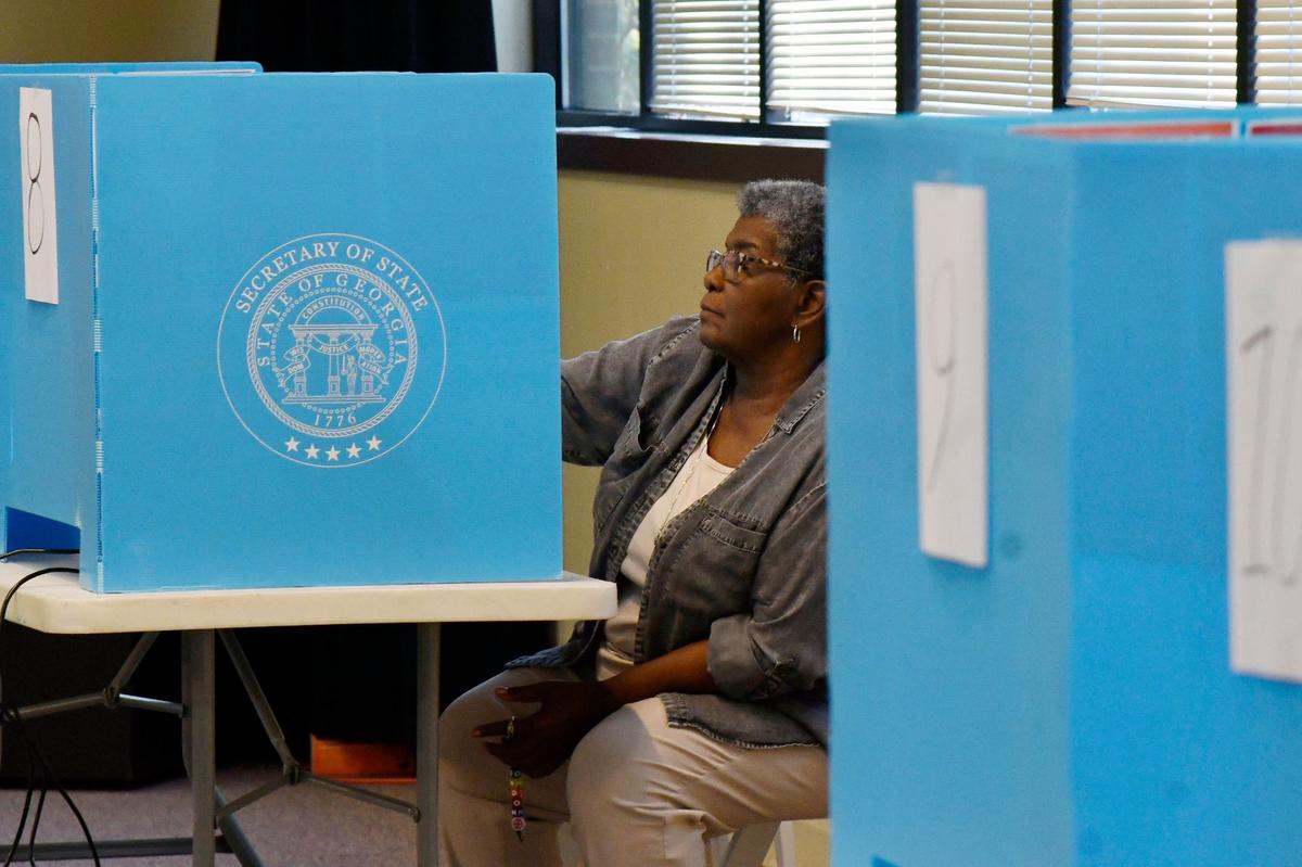 Ann Callaway fills out her electronic ballot in the Georgia primary election at the Macon campus of Middle Georgia State University on Tuesday, May 21, 2024, in Macon, Georgia. The ballot includes local races for mayor, sheriff, county commissioners and other roles as well as voting for state legislature nominations.