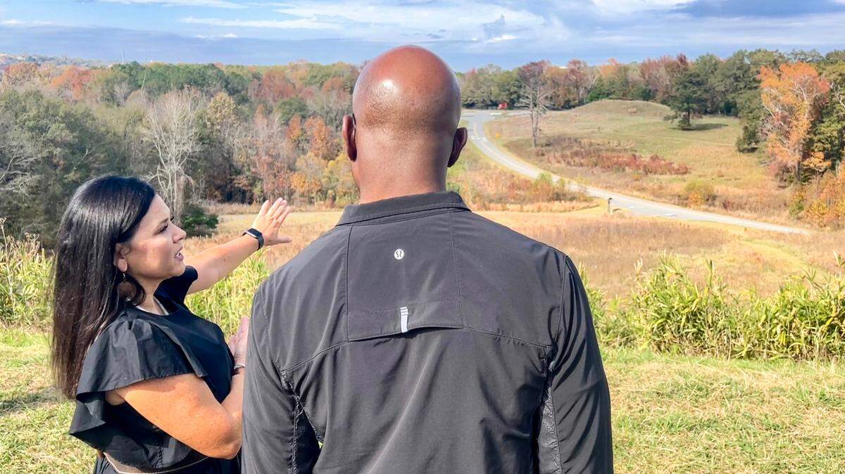 Muskogee Creek Nation citizen Tracie Revis toured Sen. Raphael Warnock on a hike in the Ocmulgee Mounds National Historic Park.