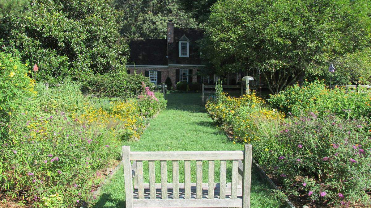 Every garden should have at least one bench, Peggy Krapf says of her favorite place for breakfast and morning meditation. (Photo courtesy Peggy Krapf)