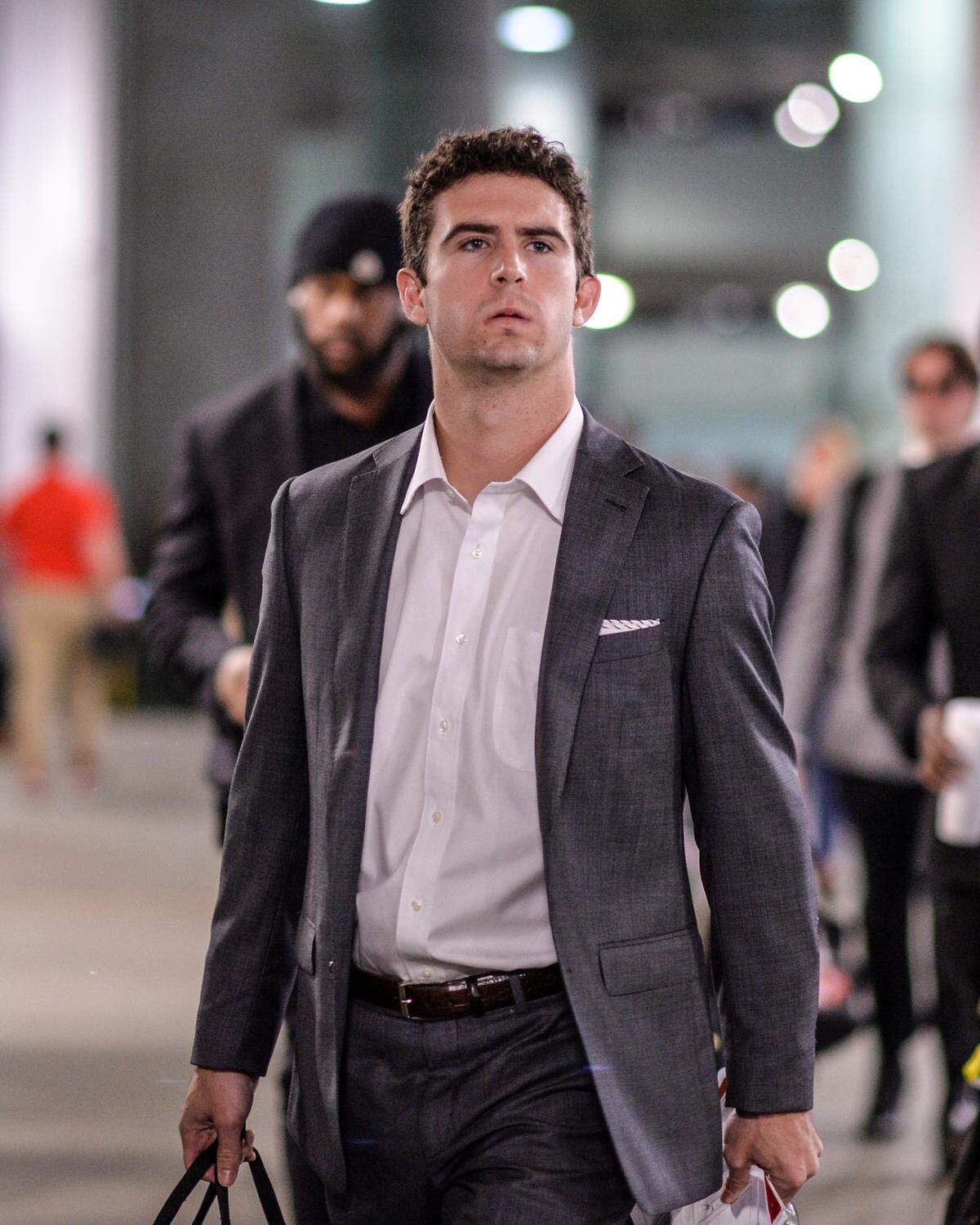 Georgia quarterback Stetson Bennett walks into Mercedes Benz Stadium in Atlanta Saturday prior to the Bulldogs’ SEC Championship game against Alabama.
