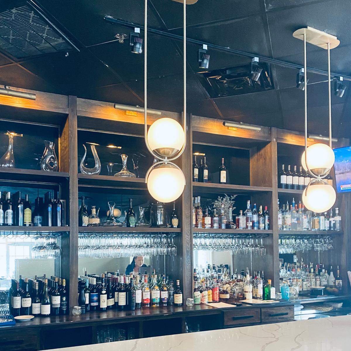The dimly lit bar at Circa is a must-see spot, especially for a romantic date night.