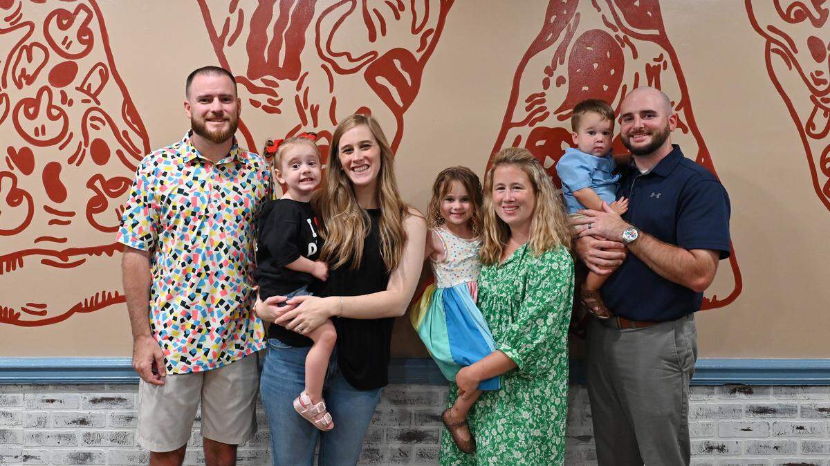 The Klines at their Warner Robins restaurant, My Father’s Place. From left to right Jacob and Hope Kline, with their daughter, Nora, and Jamie and Jonathan Kline, with their daughter, Lakelyn, and son, Beckham.