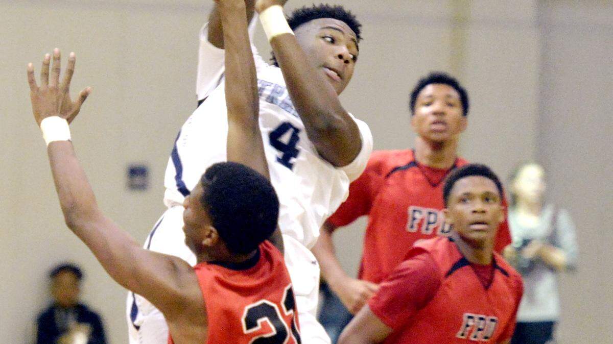Stratford's Tyler Jordan (4) passes out of pressure during their game against FPD Tuesday night.