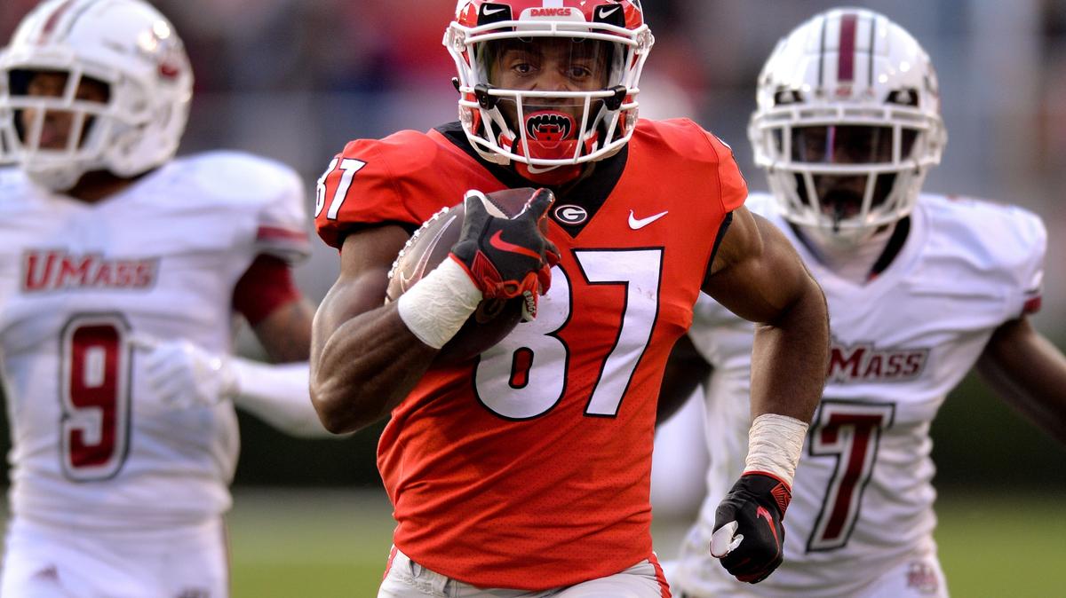 Georgia wide receiver Tyler Simmons heads to the endzone for a touchdown against UMass Saturday in Athens.