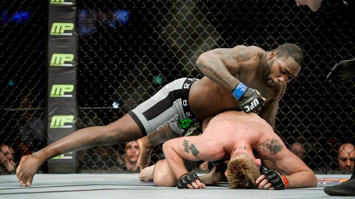 Anthony “Rumble” Johnson, top, of the US fights with Alexander “The Mauler” Gustafsson of Sweden in their UFC light heavyweight mixed martial arts bout at Tele2 Arena in Stockholm, Sweden, on Saturday, Jan. 24, 2015.