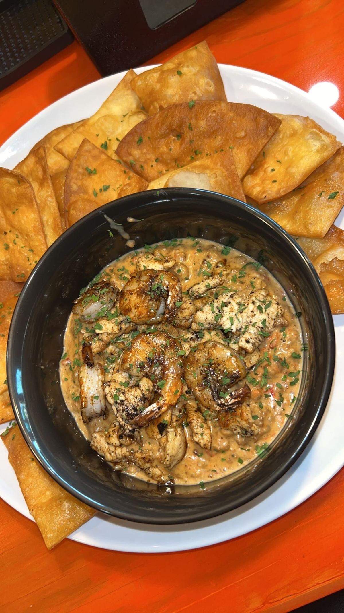 Key house dip at Prominent Bar and Restaurant in Byron. The dish includes ground beef, shrimp and chicken, cheese, Rotel tomatoes.