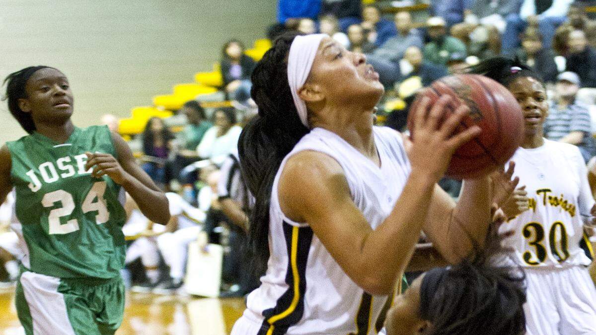 Peach County's Nausia Woolfolk (10) drives through the line during the Trojans' game with Josey on Tuesday in the GHSA Class AAA Tournament.