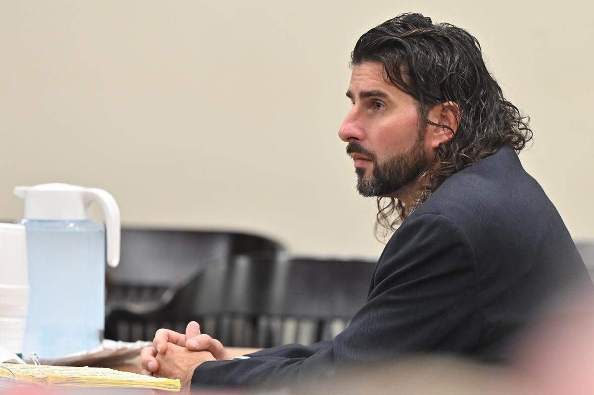 Raymond Leverett listens during closing statements on Thursday, Jan. 22, 2026, at the Bibb County Courthouse in Macon, Georgia. Leverrett is charged with murder, aggravated assault, and armed robbery charges tied to the 2018 death of John “J3” Fleming III. 