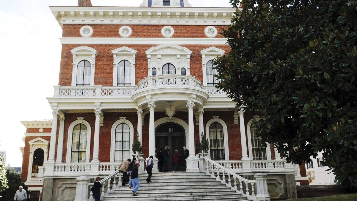 Visitors walk up the steps of the Hay House on Nov. 28, 2010.
