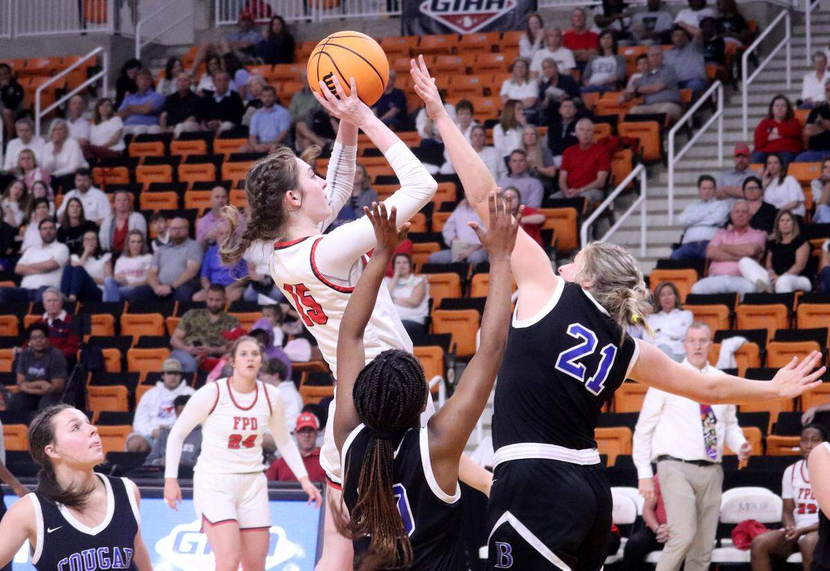 FPD’s Faith Wasden (15) shoots over a Brookstone defender during their GIAA semifinal game Wednesday night at Mercer.