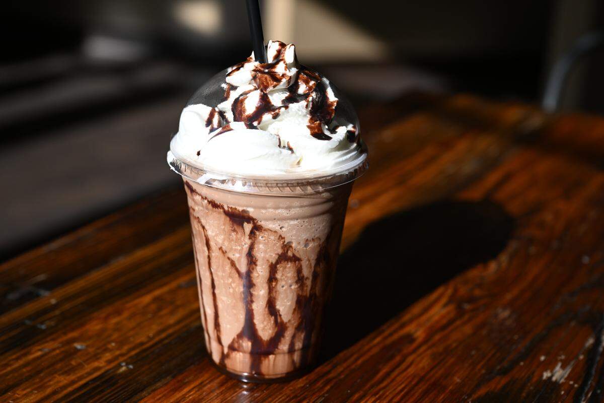 The Mule Barn’s “Festus” sits on a table inside the cafe on Friday, Jan. 16, 2026, in Macon, Georgia. The drink features features espresso and ice cream in an ice frappe and is one of their popular menu items.