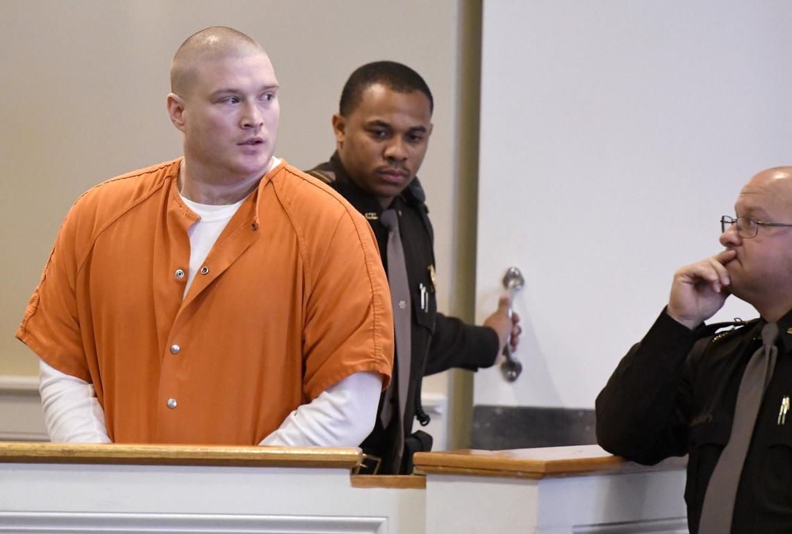 Gator Shaw is escorted into a Crawford County courtroom during his plea hearing Wednesday.