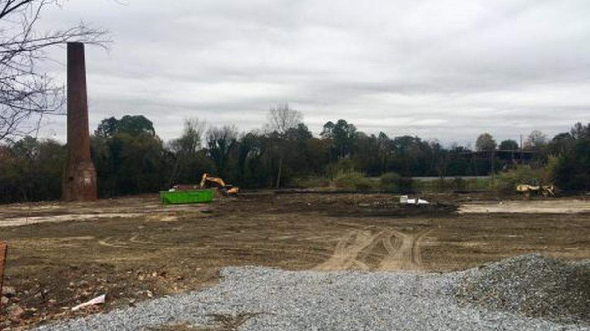 Heavy equipment clears the site of the old Atlantic Cotton Mill for the Macon Water Authority’s new water tower that will be erected in 2021. (