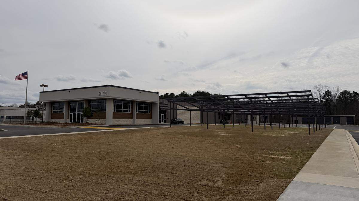 The Innovation and Technology Academy on 2122 Eisenhower Parkway will open for the fall 2026 semester. The frames to the right will eventually hold solar panels.