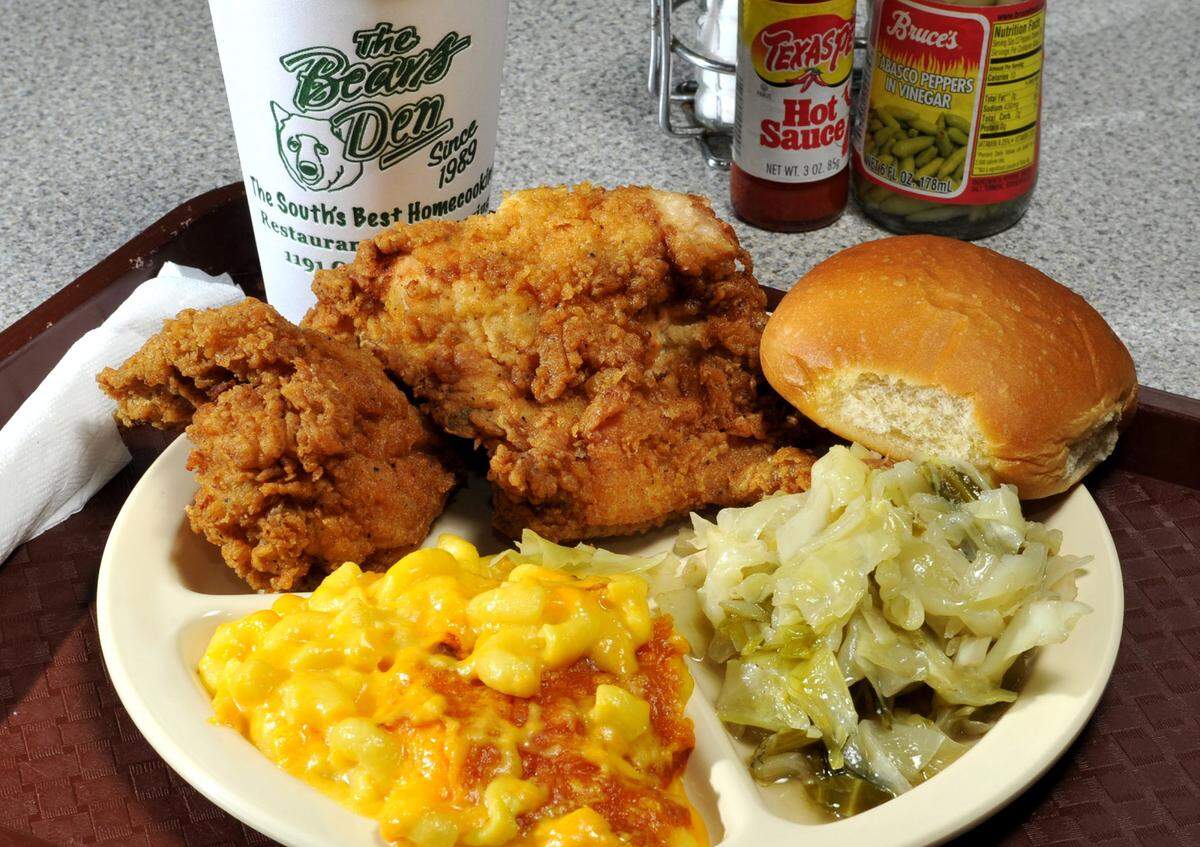 Fried chicken, cabbage, macaroni and cheese and a roll are among the menu items at the Bear’s Den.