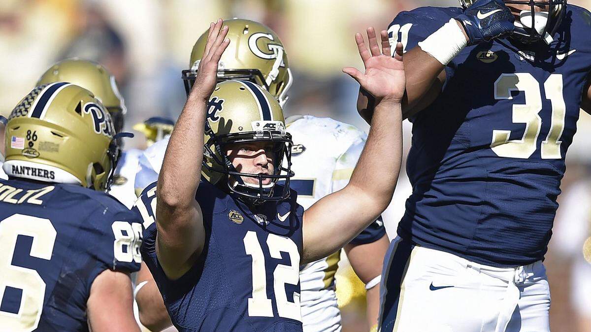 Pittsburgh place-kicker Chris Blewitt (12) celebrates the go-ahead field goal he made during the fourth quarter Saturday at Georgia Tech.