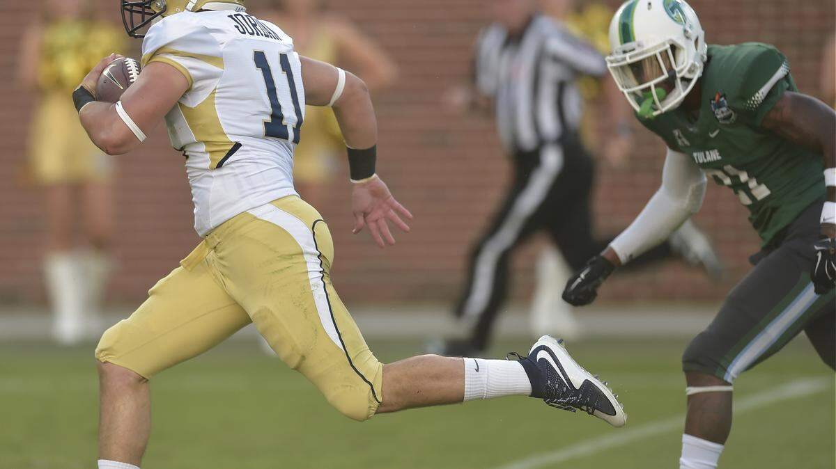 Georgia Tech quarterback Matthew Jordan (11) heads to the end zone against Tulane during the second half of an NCAA college football game, Saturday, Sept. 12, 2015, in Atlanta. Jordan scored a touchdown on the play. Georgia Tech won 65-10. (AP Photo/Mike Stewart)