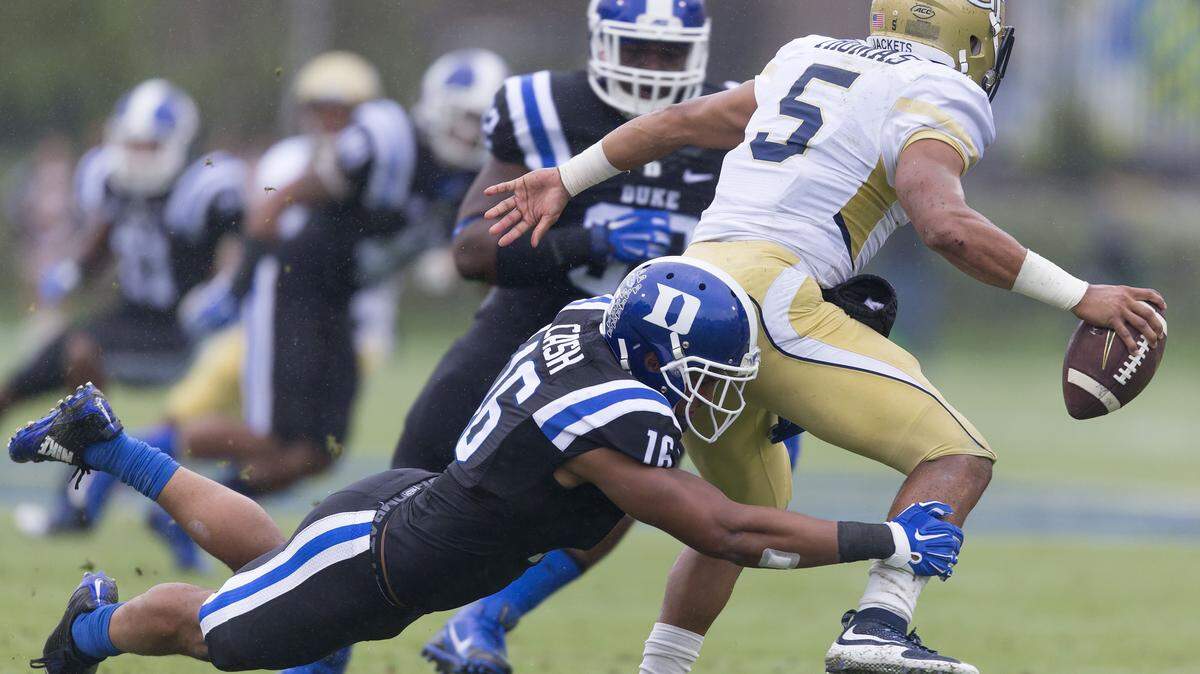 FILE - In this Sept. 26, 2015, file photo, Duke's Jeremy Cash tackles Georgia Tech's Justin Thomas for a loss during the first half of an NCAA college football game, in Durham, N.C. Georgia Tech fell out of the Top 25 with its loss to Duke. (AP Photo/Rob Brown)