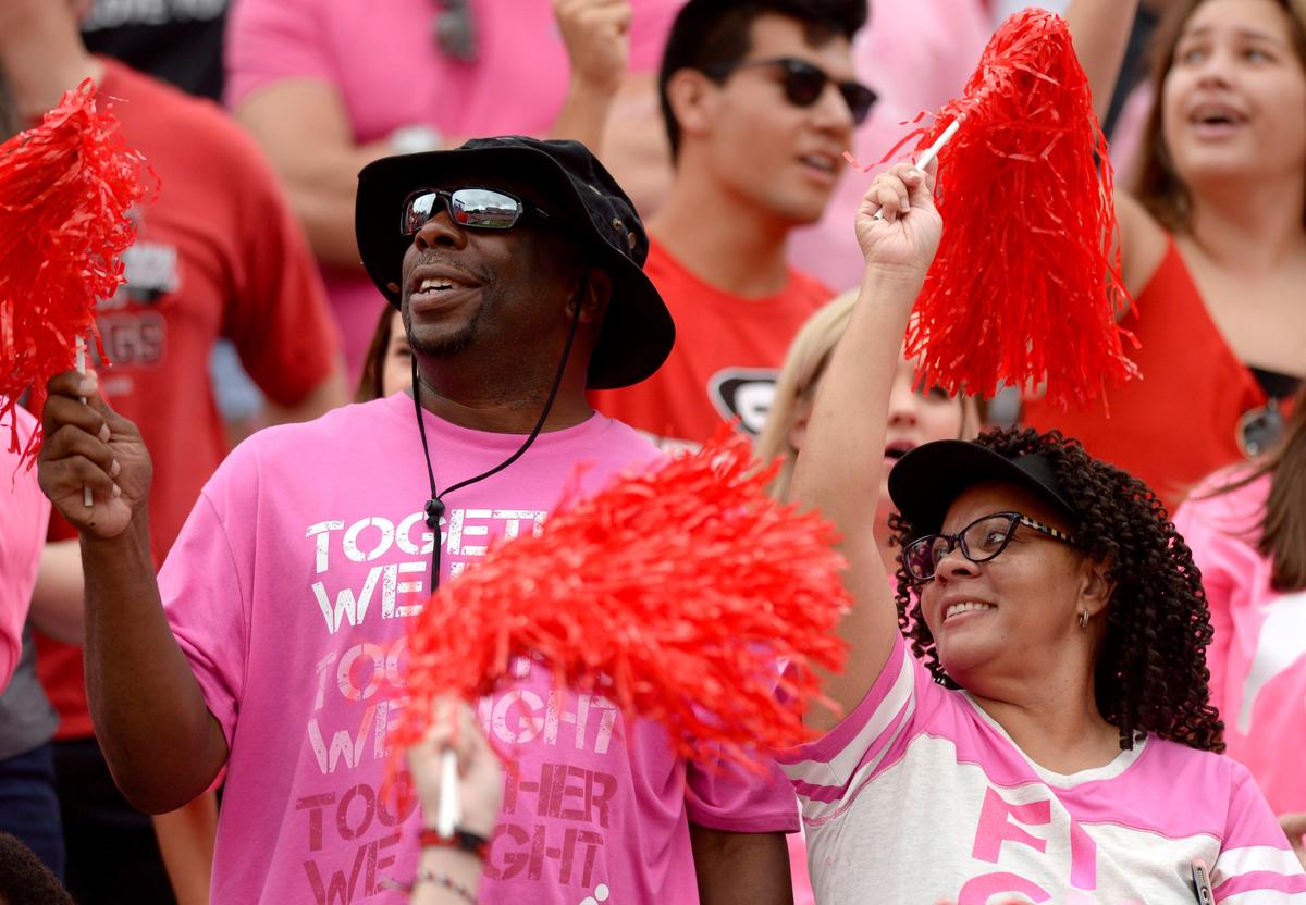 Georgia fans cheer on the Bulldogs while showing support for Arkansas State head coach Blake Anderson. Anderson’s wife Wendy died recently of breast cancer. Fans orchestrated a Pink Out for the game.