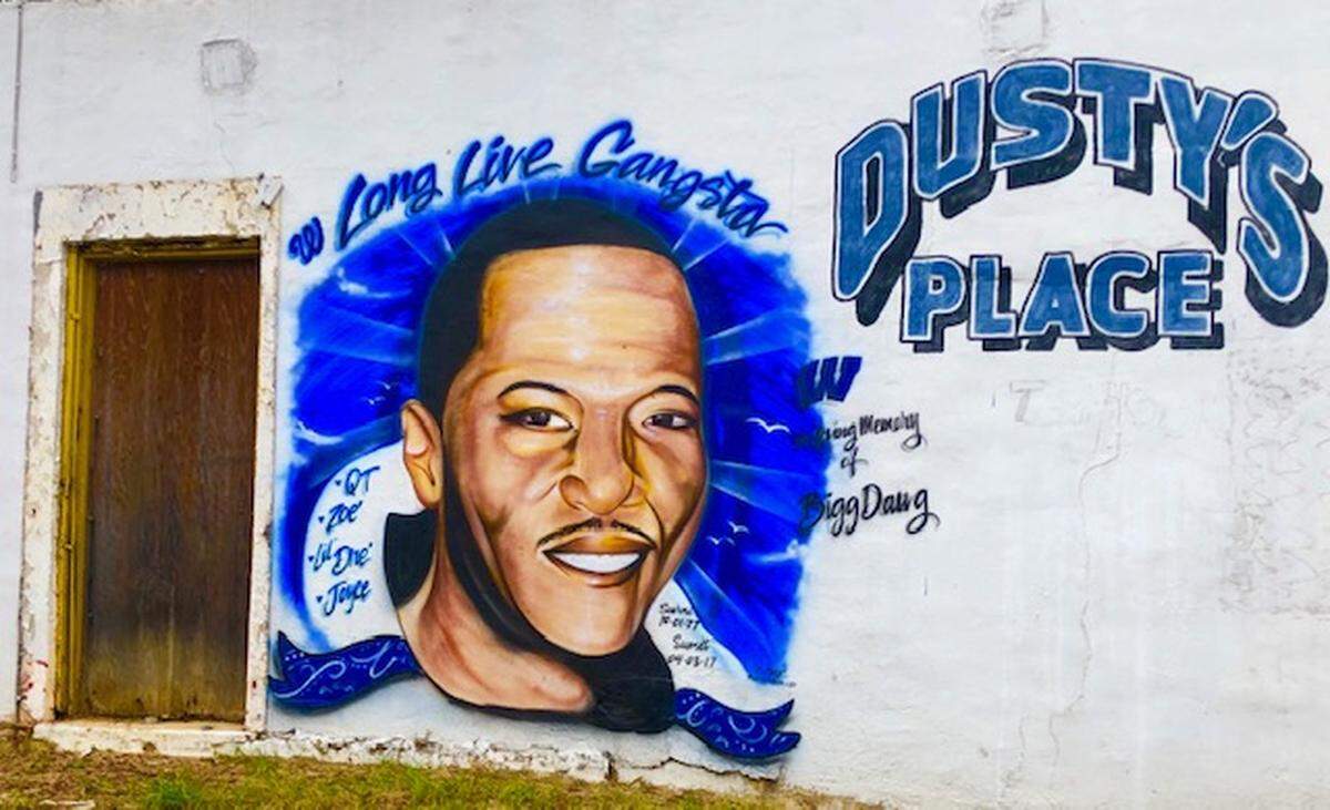 A mural of Andre Taylor, who was shot and killed in April 2017, was recently painted at the corner of Pansy and Montpelier avenues, overlooking the spot outside M&M Grocery where he was fatally wounded.