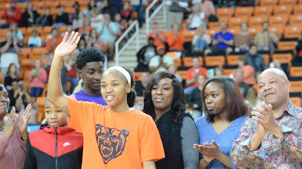 Mercer guard, Keke Calloway celebrates on Senior night with her family. The former Mary Persons stand out is hoping to capture another title before the end of her career at Mercer.