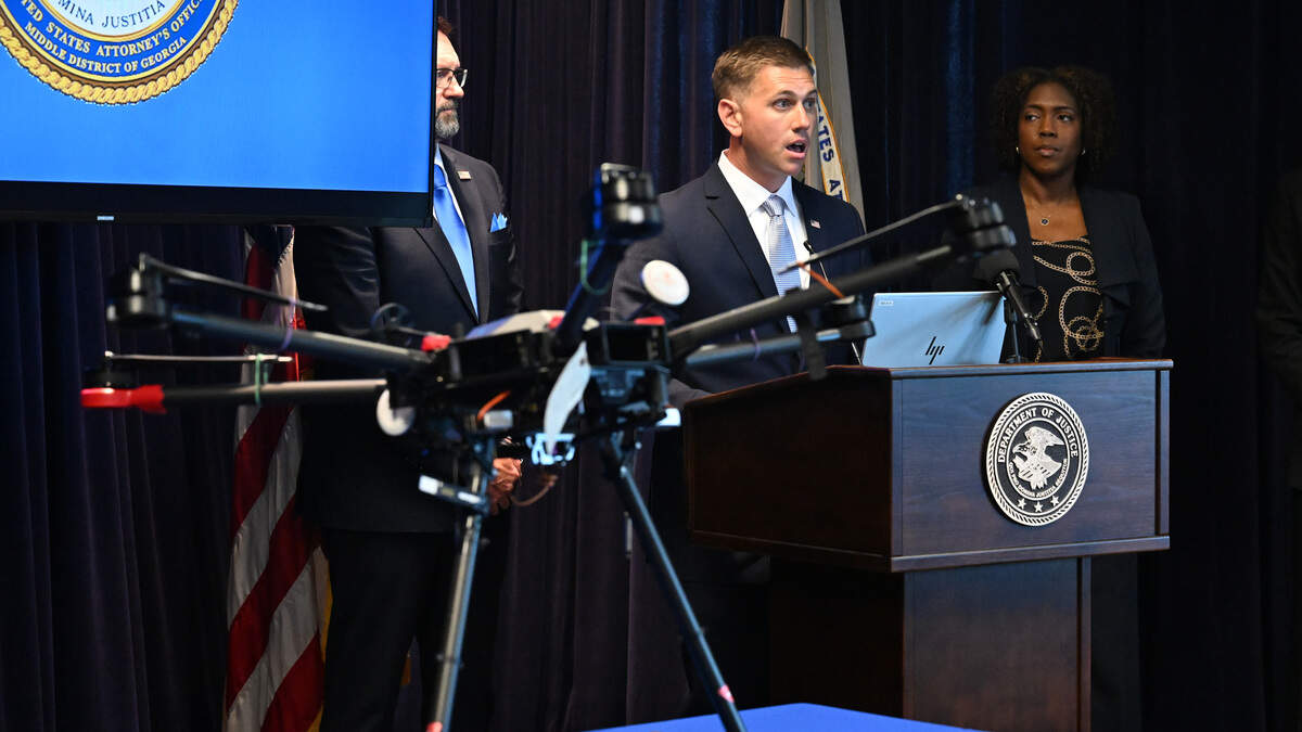 U.S. Attorney of the Middle District of Georgia Will Keyes speaks to media during a news conference on a drone smuggling operation at several federal prisons, on Wednesday, June 24, 2026, in Macon, Ga. Twelve individuals were indicted for an alleged conspiracy to bring contraband, like drugs and cellphones, into prisons across the Southeast.