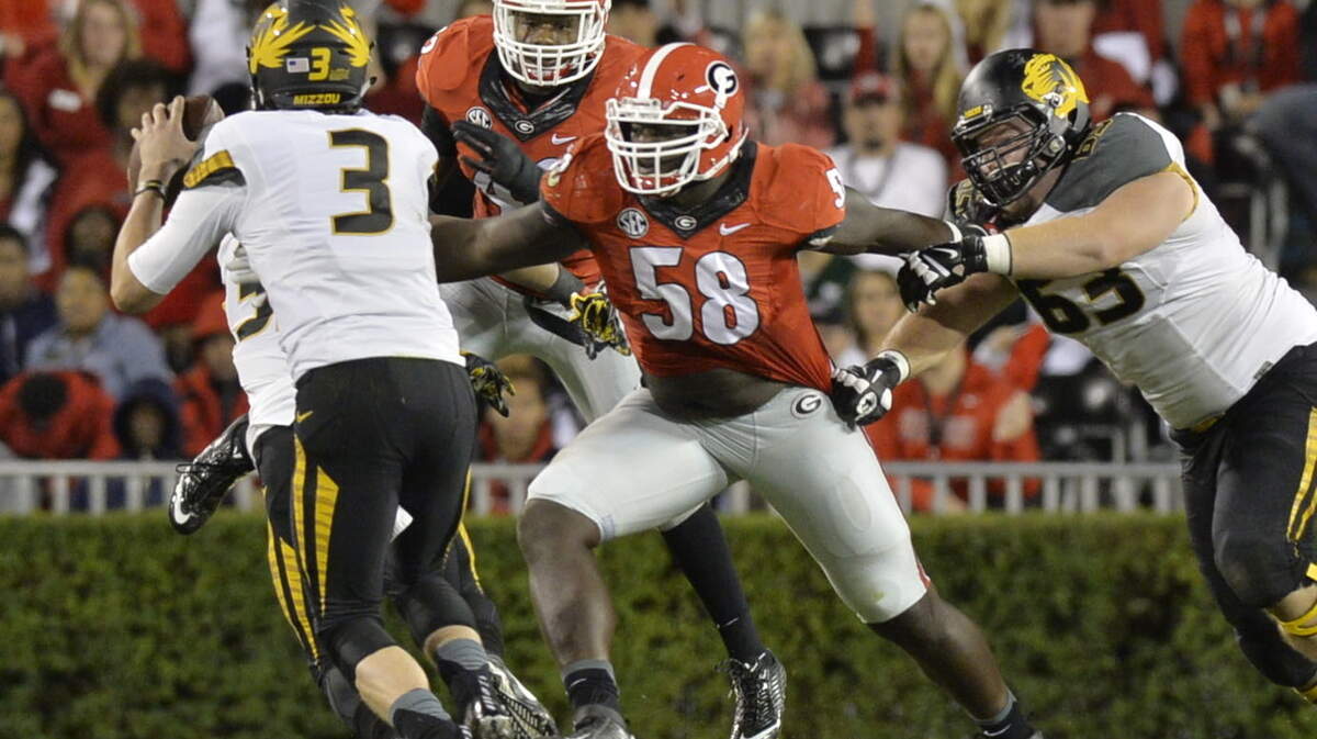 BEAU CABELL/THE TELEGRAPH 
 Athens, Ga., 10/17/2015: Georgia's Sterling Bailey (58) closes in on a first half sack of Mizzou quarterback Drew Lock.