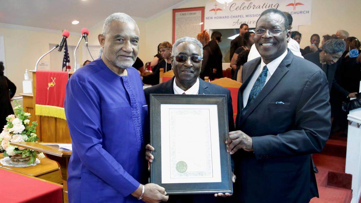 From left: Former Macon Mayor C. Jack Ellis, the Rev. Cleveland Jarrell and the Rev. Henry Ficklin celebrated New Howard Chapel Missionary Baptist Church’s 150th anniversary last Sunday.