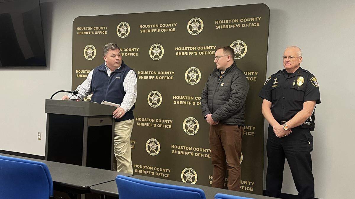 (left to right) Houston County Sheriff Matt Moulton, Houston County District Attorney Eric Edwards and Warner Robins Police Chief Wayne Fisher spoke on Thursday, Jan. 29, 2026, at a press conference at the Houston County Sheriff’s Office. They shared details about a woman and police officer who were shot earlier that day in Warner Robins, Ga.