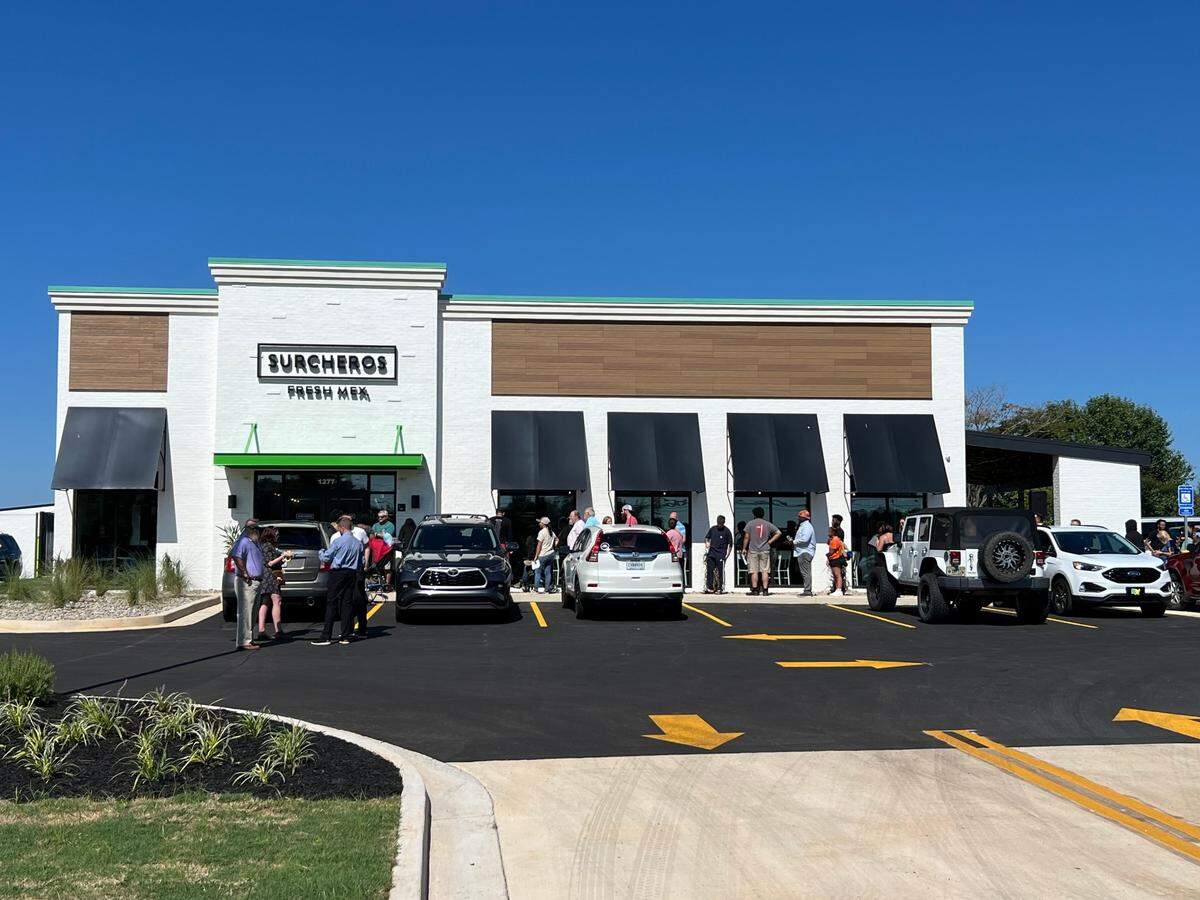 Some patrons camped out before the opening of the new Surcheros Fresh Mex in Warner Robins for an offer of free burritos for a year for the first 50 people to order via the restaurant’s app. A line wrapped around from the front door to the back door by 9 a.m.