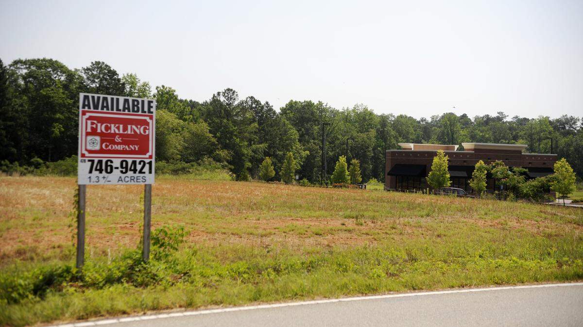 In this image from 2011, J. Christopher’s restaurant on Starcadia Circle off Bass Road in Macon sits by itself surrounded by potential development.