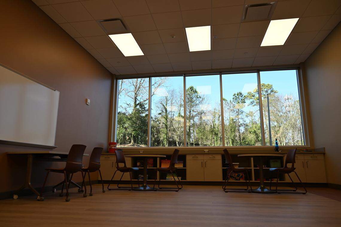 The game room on the Community Integration Options side of the new River Edge Adult Peer Support and Community Integration Center features board games on Tuesday, Jan. 27, 2026, in Macon, Georgia. The Community Integration side of the building will support day programming for adults with intellectual and developmental disabilities between ages 30 and 40.