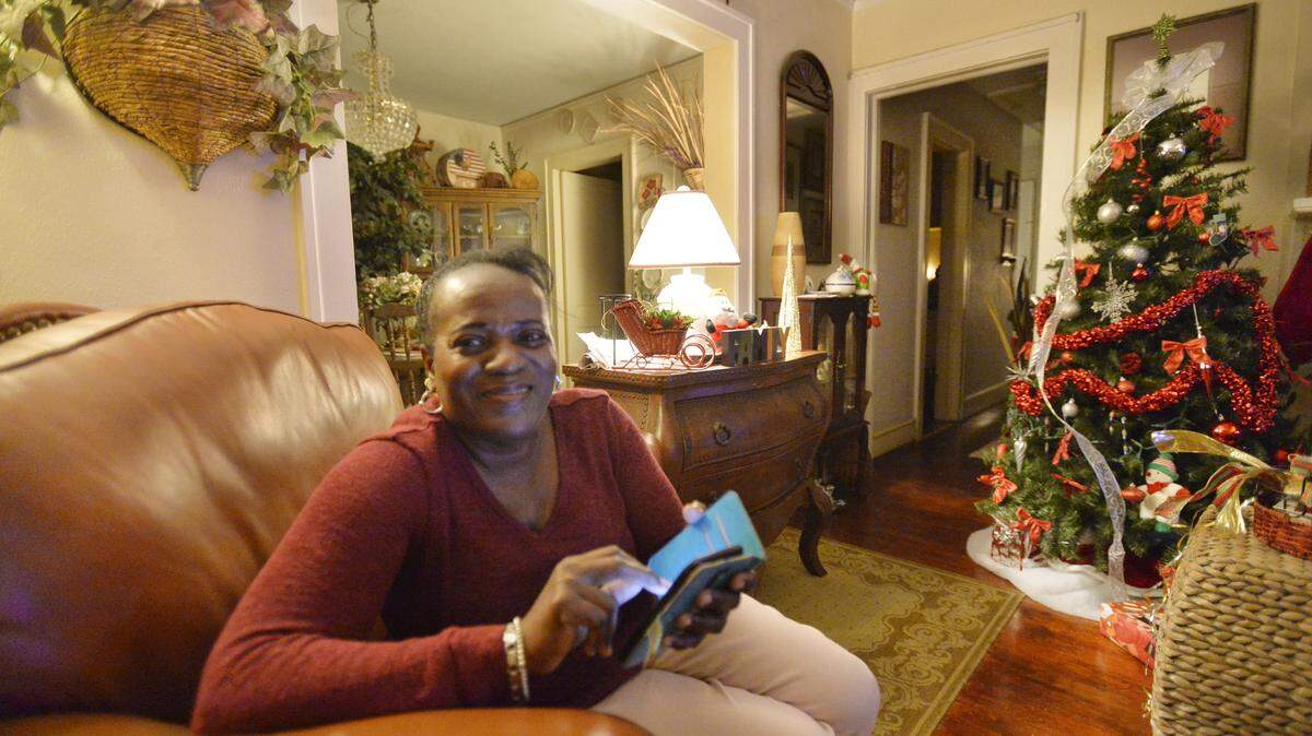 LaVerne Woodford says discipline used to control the impulses to use credit cards and pay off creditors has improved her life as she shops for a new house and a mortgage.
