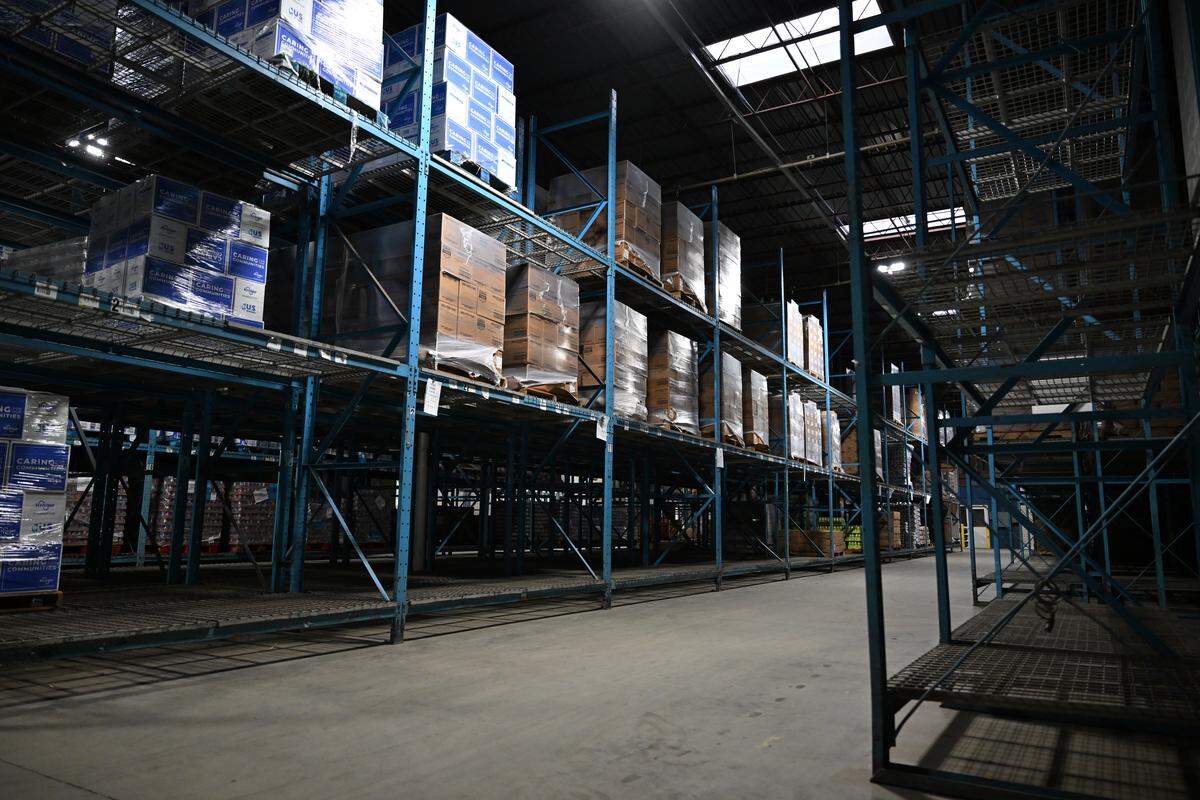 Empty and partially filled shelves sit inside the Middle Georgia Community Food Bank on Wednesday, Oct. 29, 2025, in Macon, Georgia. Middle Georgia Community Food Bank executive director Kathy McCollum said that shelves were full at the end of January and the food bank is working with limited resources. 