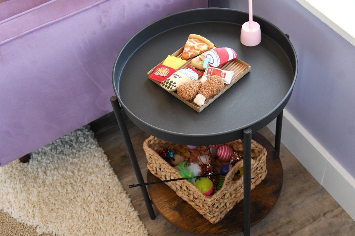 Various cat toys sit on an end table in Paws Awhile Cat Cafe on Thursday, July 11, 2024, in Perry, Georgia. The new cat cafe plans to open this summer and will partner with the Humane Society of Houston County and other rescue groups to have adoptable cats in the cafe.