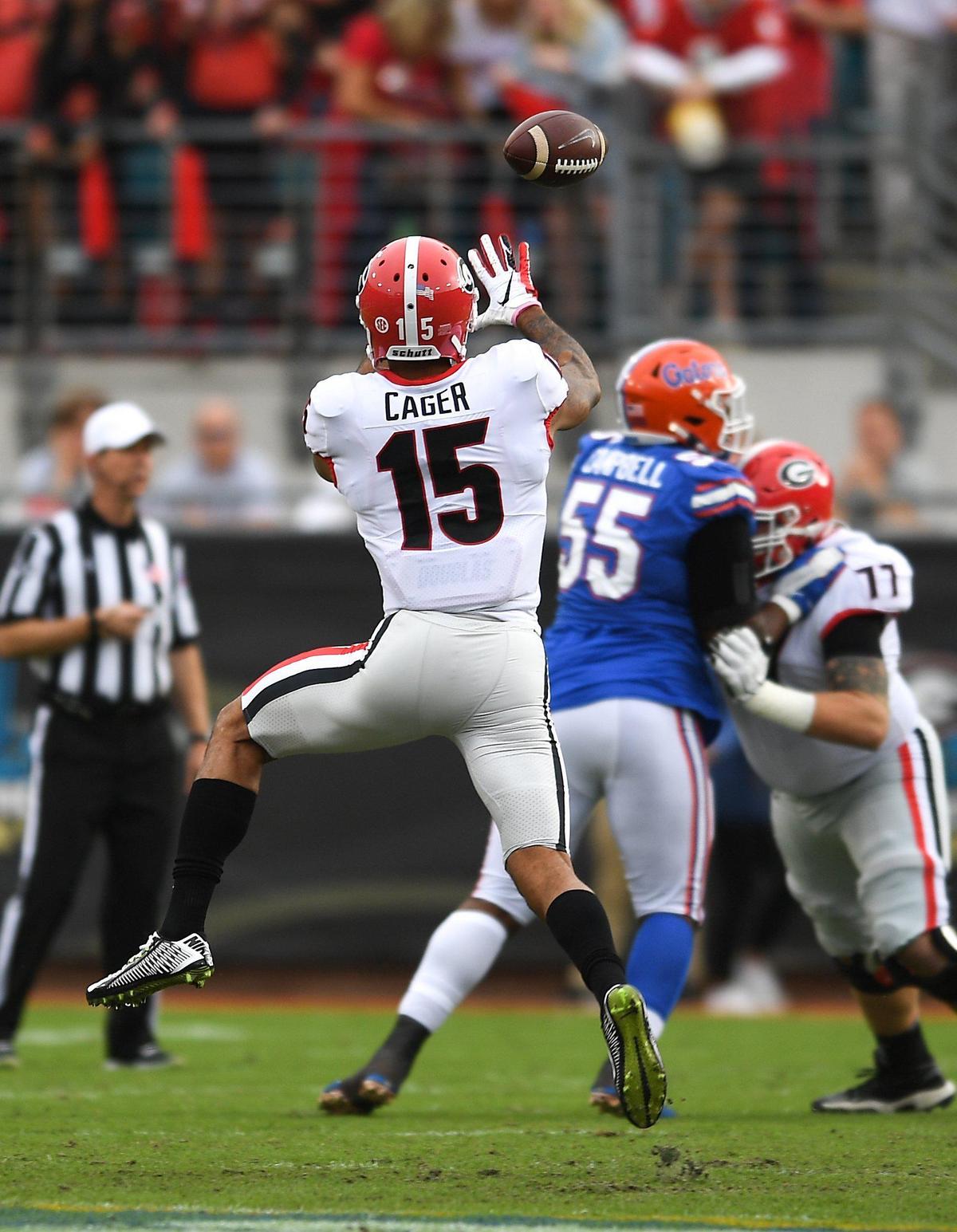 Georgia receiver Lawerence Cager hauls in a Jake Fromm pass in action Saturday against the Florida Gators.