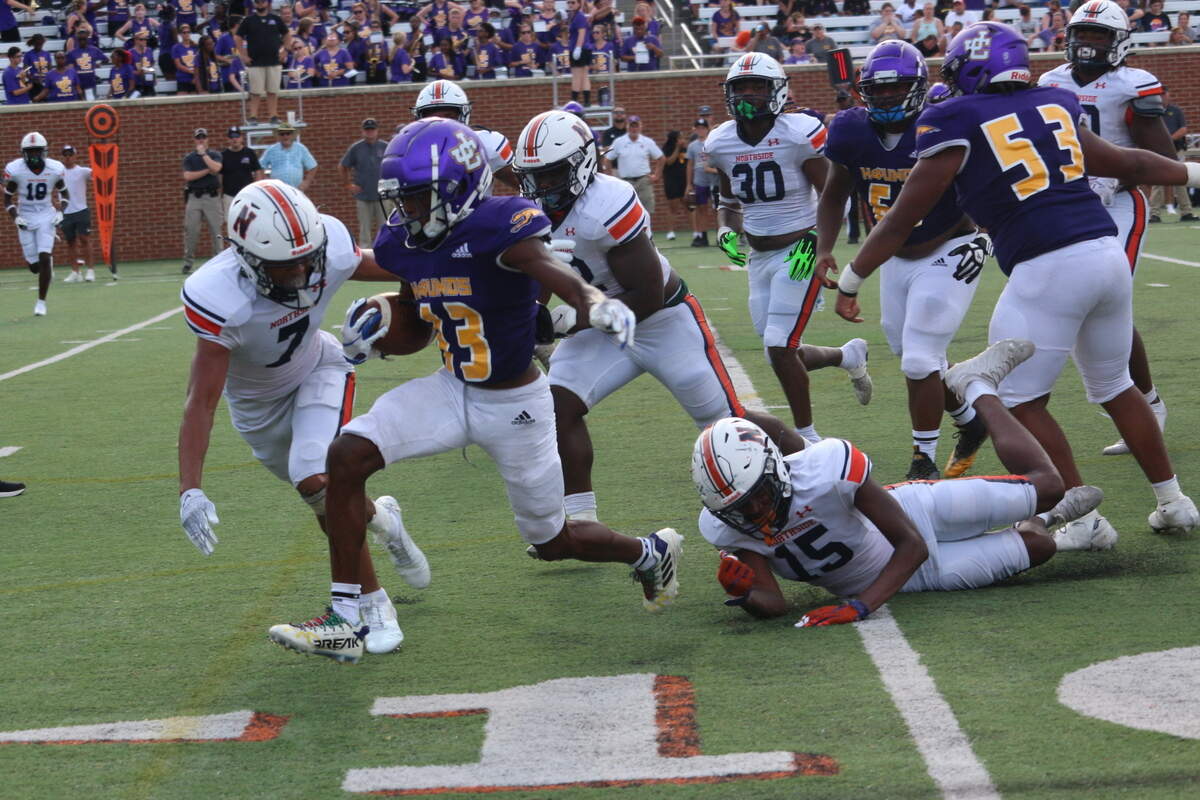 Jones County running back Zion Ragins breaks away from Northside defenders during the Greyhounds’ 27-21 victory over the Eagles. Ragins accounted for 114 total yards and two touchdowns, and had one long touchdown run called back because of penalty.