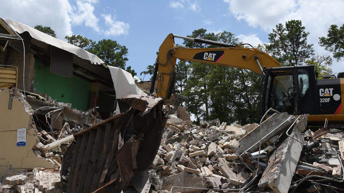 A blighted motel building on Ingleside Avenue and Riverside Drive in Macon, Ga. was demolished Wednesday, July 19, 2024, as part of Macon-Bibb County’s Blight Fight initiative. The site will be replaced with the River Edge Behavioral Health Peer Support and Community Adult Center to be completed by 2026.