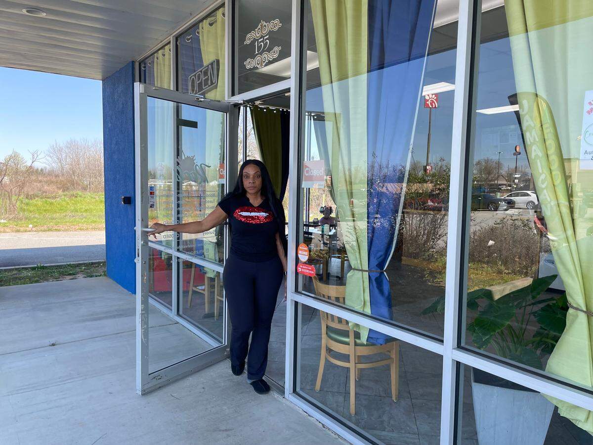 Co-owner Sherwauna Cunningham opens the door at Crooklyn Roots, a new geared-for-take-out restaurant that offers authentic Jamaican cuisine and vegan dishes in Byron. This is the second family owned and operated restaurant for Sherwauna and her husband, Winston.