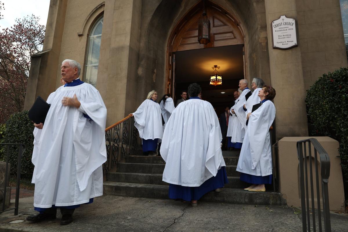 Members of the Christ Church Episcopal choir wait outside before proceeding into the church at the start of the bicentennial service on Thursday, Feb. 27, 2025, in Macon, Georgia. Christ Church marked the 200th anniversary of its founding with a celebratory service that included top church leadership from the Episcopal Archdiocese of Atlanta, church members as well as faith and local leaders from Macon.
