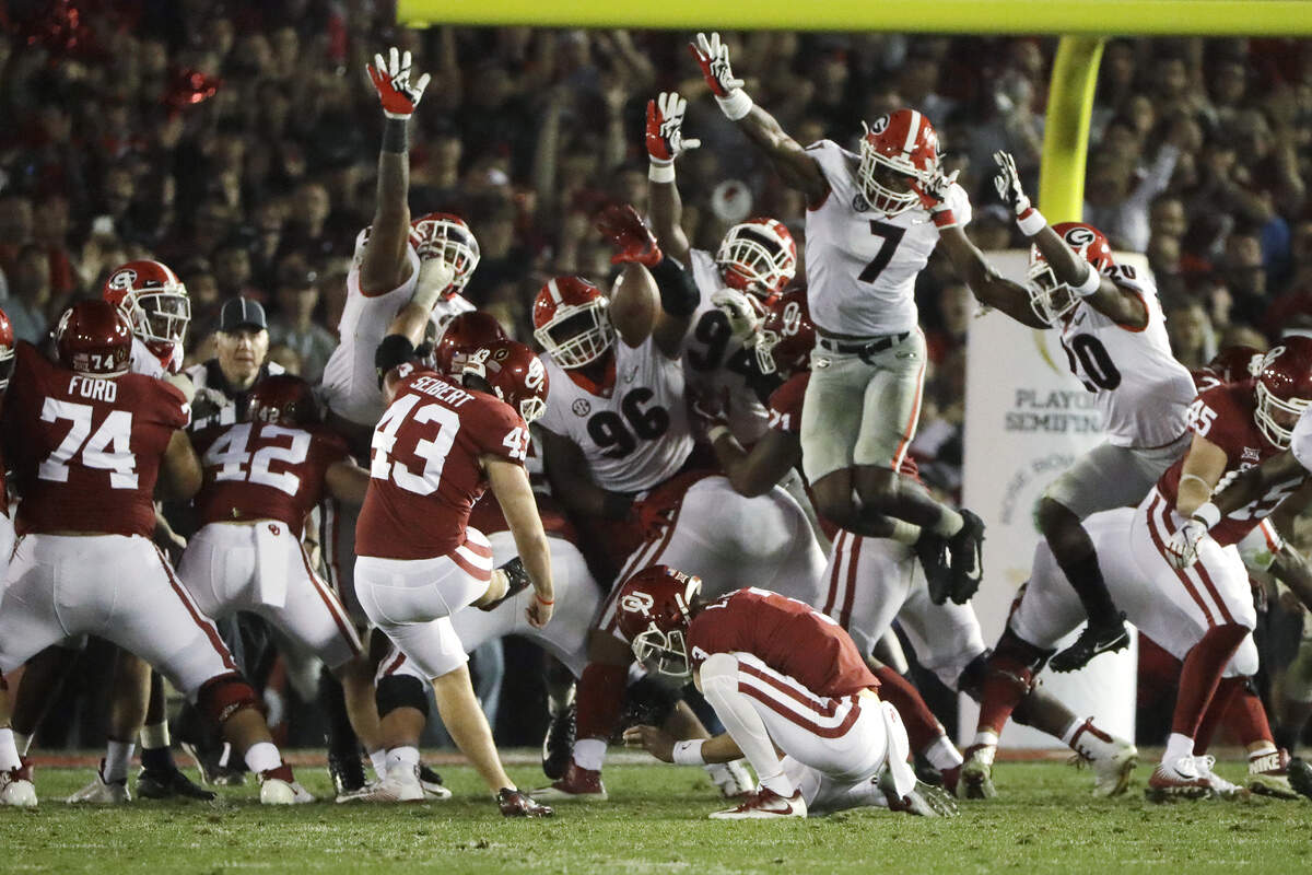 Georgia linebacker Lorenzo Carter (7) blocks a field goal attempted by Oklahoma kicker Austin Seibert (43) during overtime in the Rose Bowl NCAA college football game Jan. 1 in Pasadena, California. Georgia won 54-48.