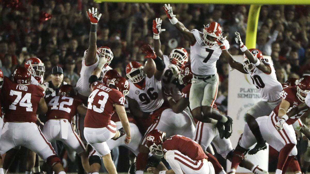 Georgia linebacker Lorenzo Carter (7) blocks a field goal attempted by Oklahoma kicker Austin Seibert (43) during overtime in the Rose Bowl NCAA college football game Jan. 1 in Pasadena, California. Georgia won 54-48.