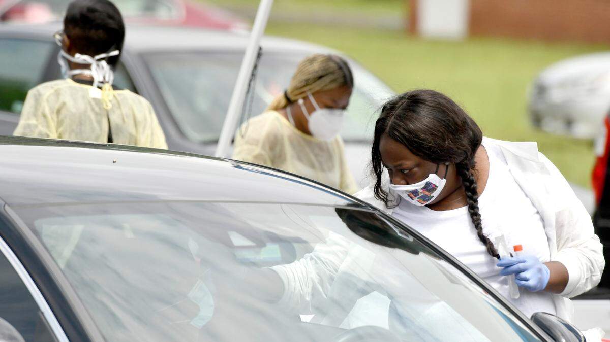 JASON VORHEES/THE TELEGRAPH Macon, GA, 07062020 The Community Church of God partnered with the Community Empowerment Center to offer free COVID-19 drive-thru antibody and swab testing July 6.